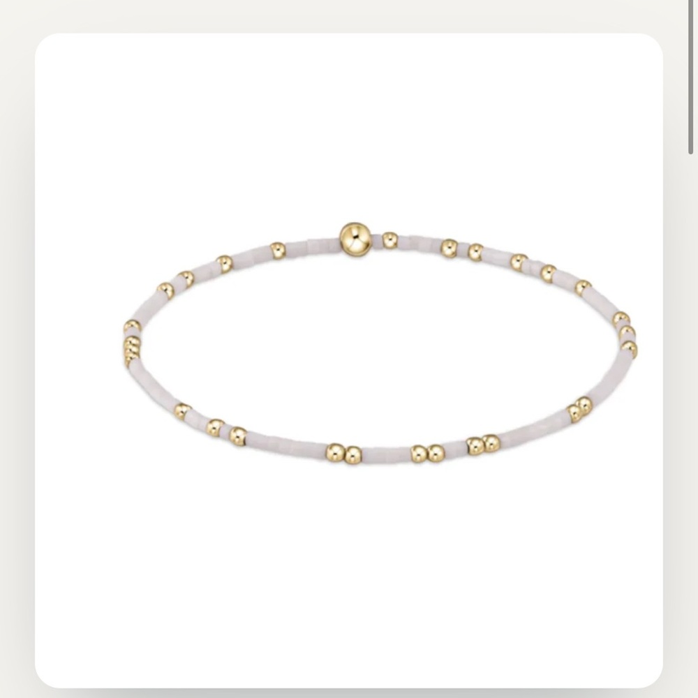 Elegant Gold and White Beaded Bracelet